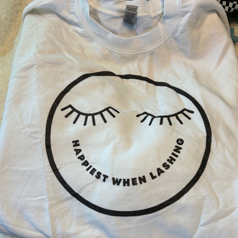 White Graphic Tee with Smiley Face Design